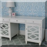 F39. White mirrored desk. 31”h x 60”w x 24”d 